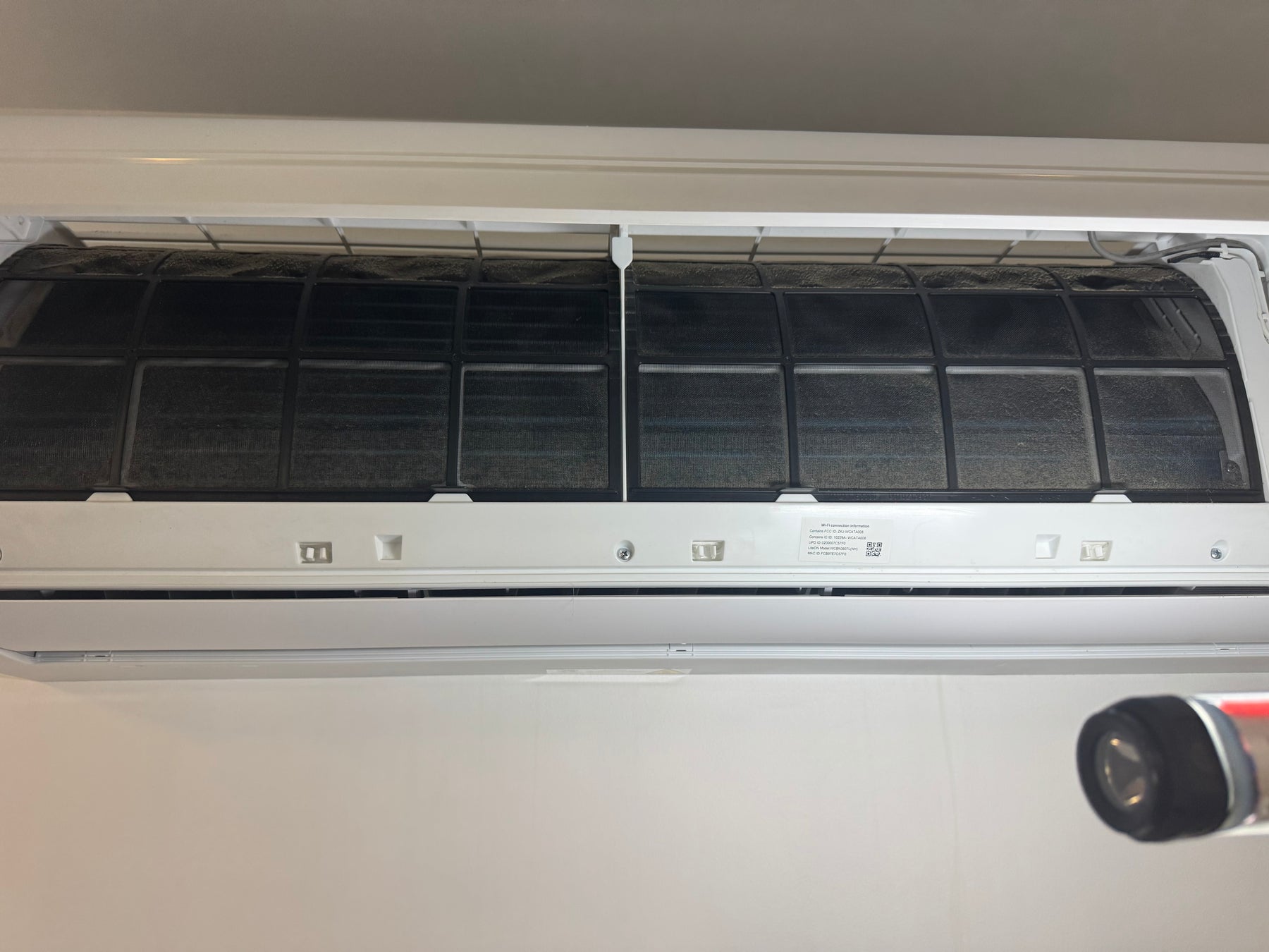 Split system air conditioner in Dakabin before its professional deep clean