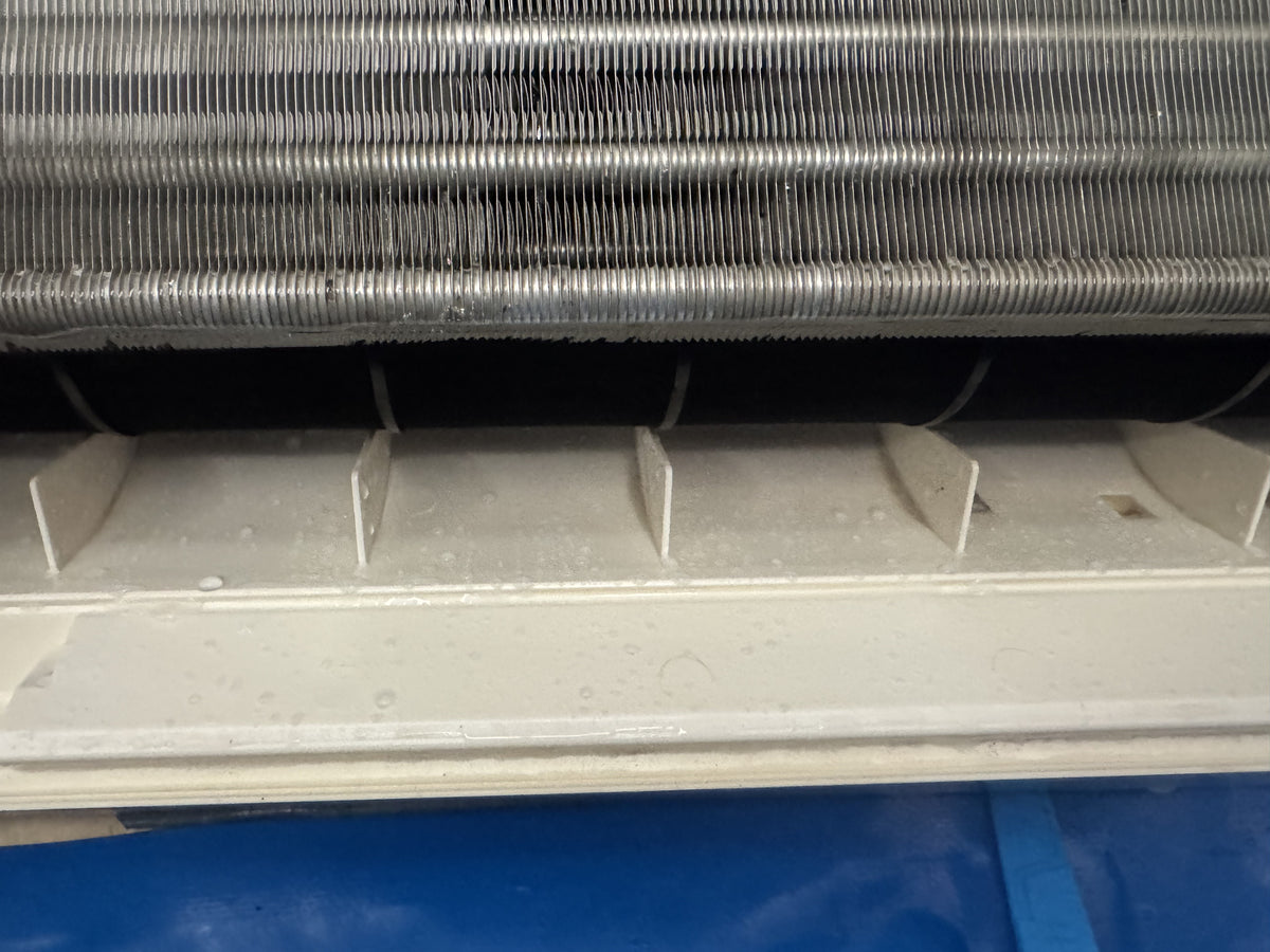After cleaning: Heavy mould and greasy build-up removed from two Aspley air cons